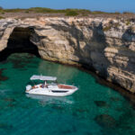 Private Otranto boat tour exploring the stunning Salento coast, with crystal-clear waters and local gastronomy onboard.
