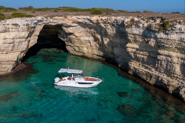 Private Otranto boat tour exploring the stunning Salento coast, with crystal-clear waters and local gastronomy onboard.